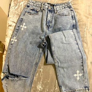 Jeans light denim ripped by knees